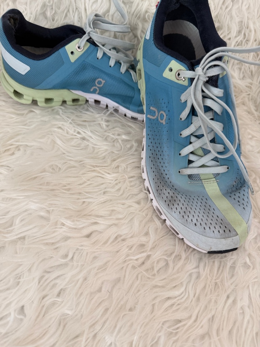 On Running Women's Athletic Shoes in Blue with Light Green Accents